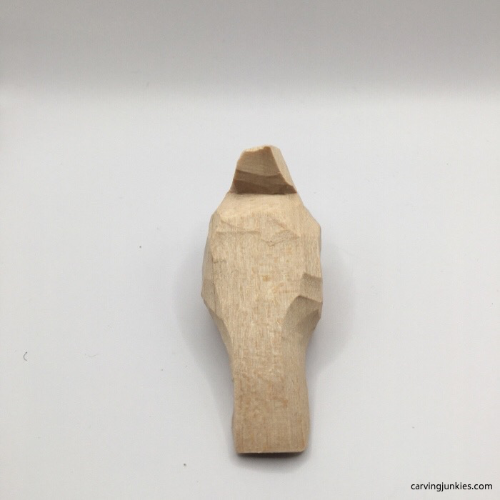 Back view of wood cardinal before painting