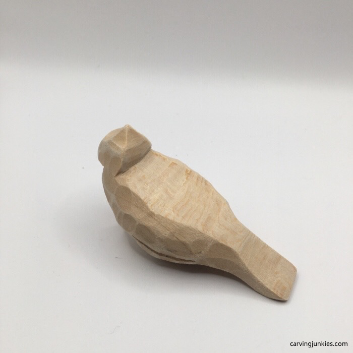 Left view of wood cardinal before painting