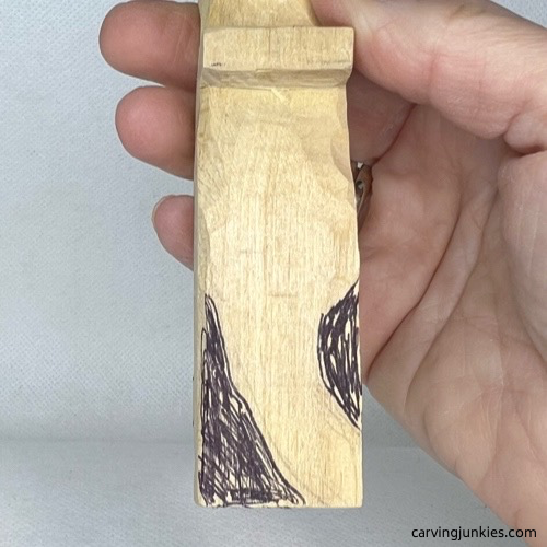 View from above to guide how the tail should be carved on a wooden alligator