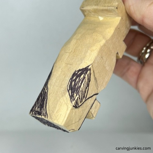 Setting up shape of tail for carving a wooden alligator