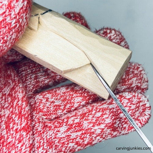 Shaping wing of wood carved angel