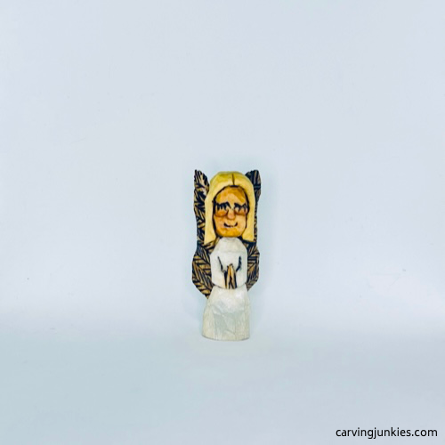 Front of painted wood carved angel