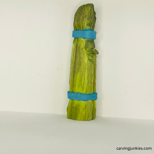 RIght view of painted wood carved asparagus