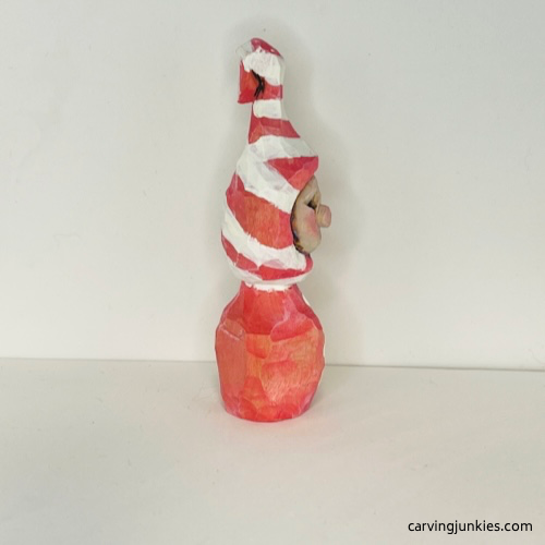 Right view of painted wood carved Christmas caroler