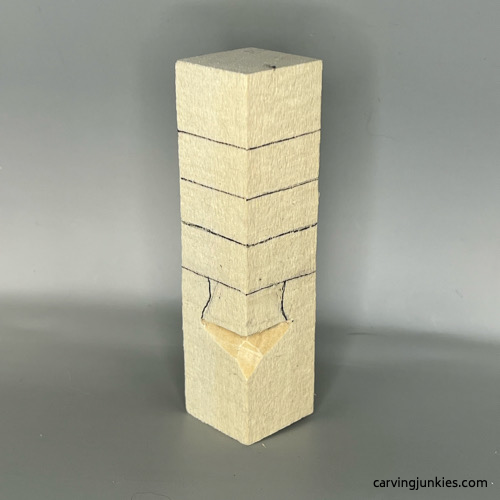 Progress of nose on wood carved Christmas tree gnome