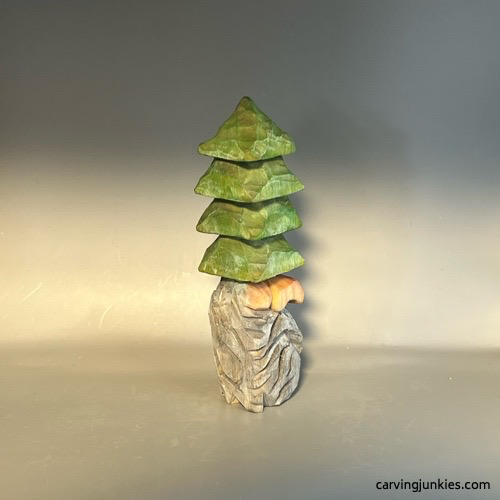 Painted right view of wood carved Christmas tree