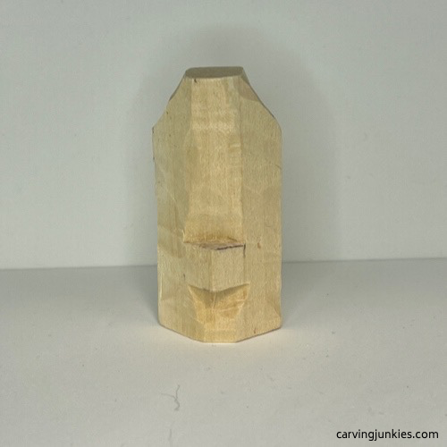 Narrowed top of wood carved Christmas tree ornament Shaped top of wood carved Christmas tree ornament