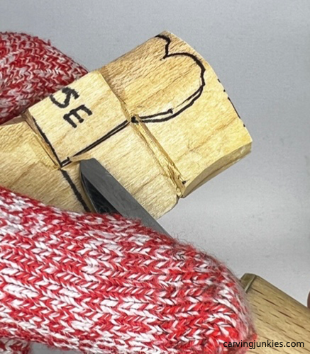 Separating nose on carved wooden dog