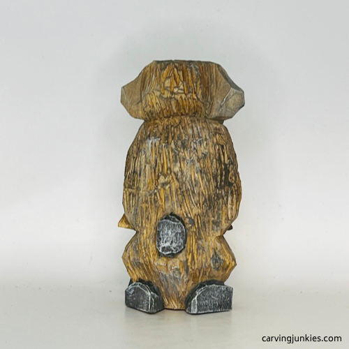 Back view of painted wood carved dog