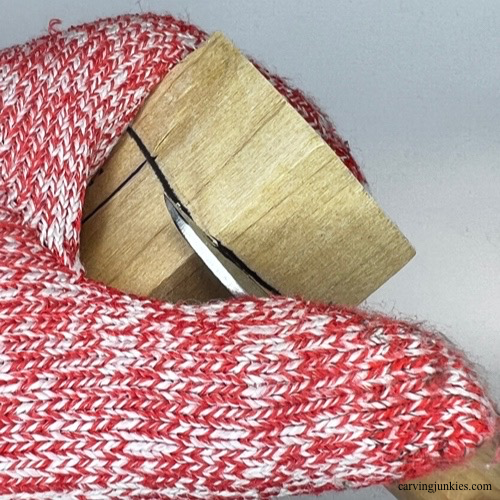 Stop cut on wood carved dog