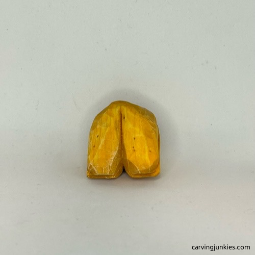 Bottom of painted wood carved fortune cookie