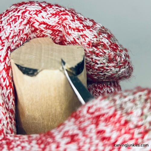 Carving curves on wood carved ghost