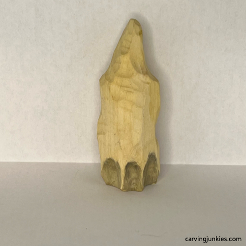 Back view of painted wood carved ghost