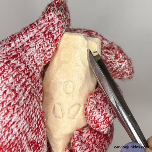 Using U gouge on wood carved ghost