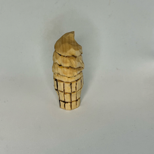 Front side of raw wood carved ice cream cone Front view of unfinished wood carved ice cream cone
