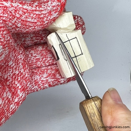 Long stop cut on carved old man