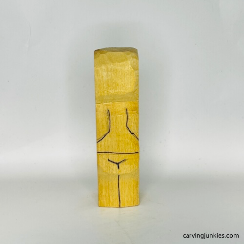 Back details drawn on tubby man wood carving Back details on tubby man wood carving