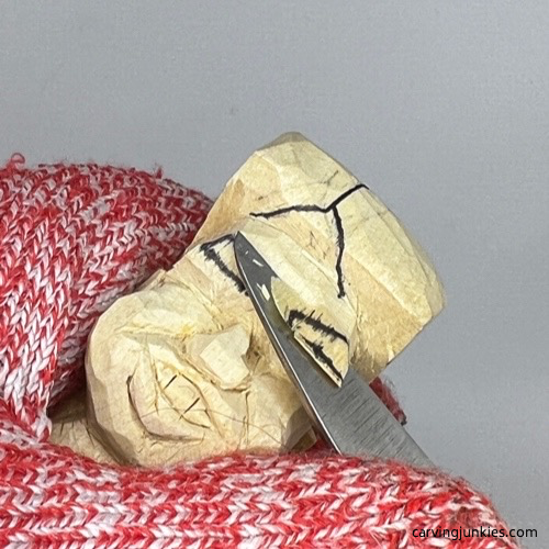 Cutting back forehead for tubby man wood carving Carving forehead on tubby man wood carving