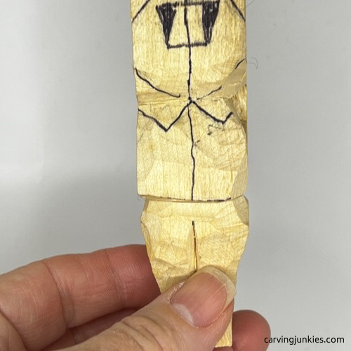 Front of details on tubby man wood carving Front progress on tubby man wood carving