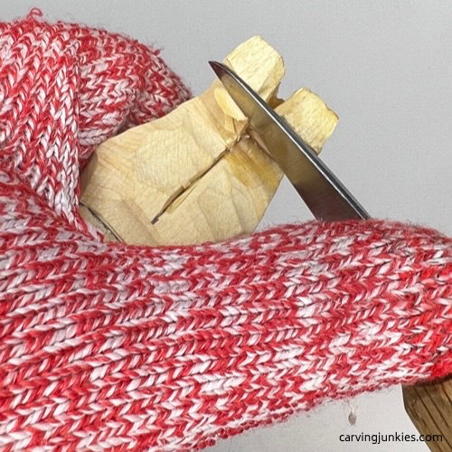 Narrowing feet on tubby man wood carving Reducing feet on tubby man wood carving