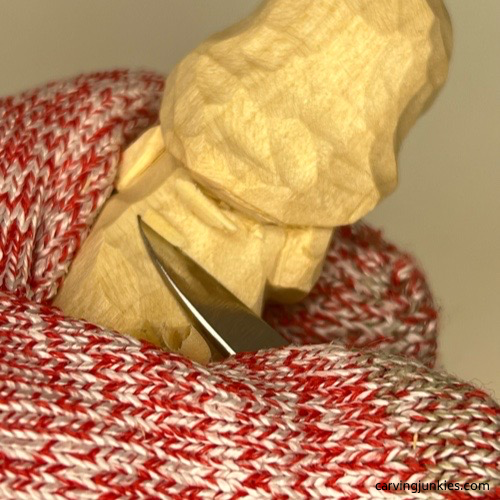 Carving back neckline on wood carved mermaid