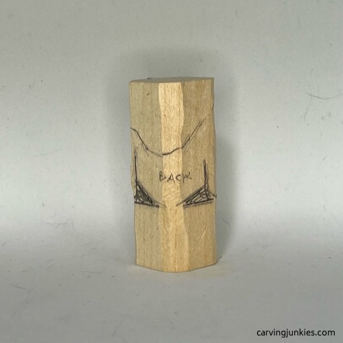 Back guidelines on wood carved mermaid