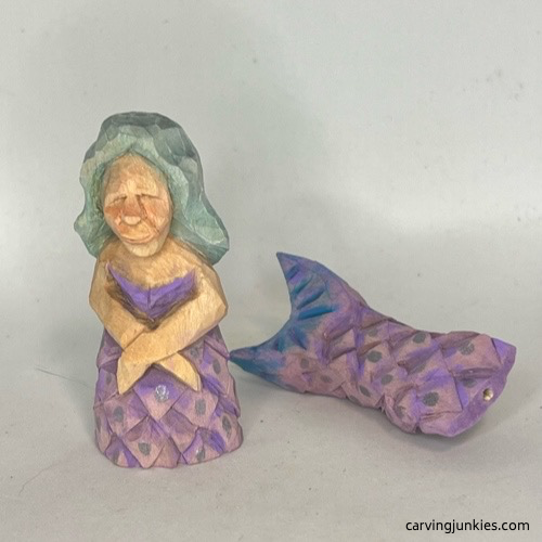 Front view of painted wood carved mermaid