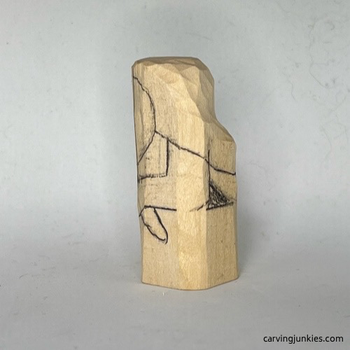 Left view of hairline on wood carved mermaid