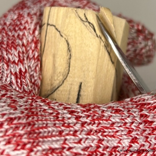 Shaping head of wood carved mermaid