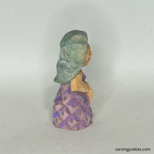 Right view of painted wood carved mermaid