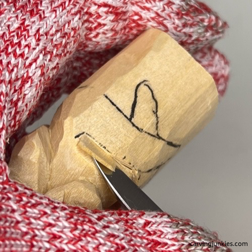 Separating arms on wood carved mermaid