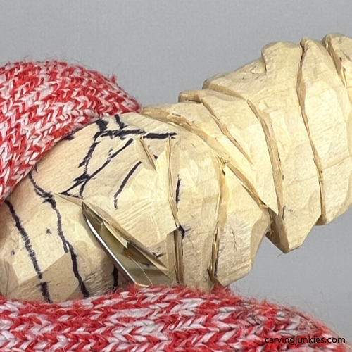 Separating arm on wood carved mummy Cutting arm on wood carved mummy