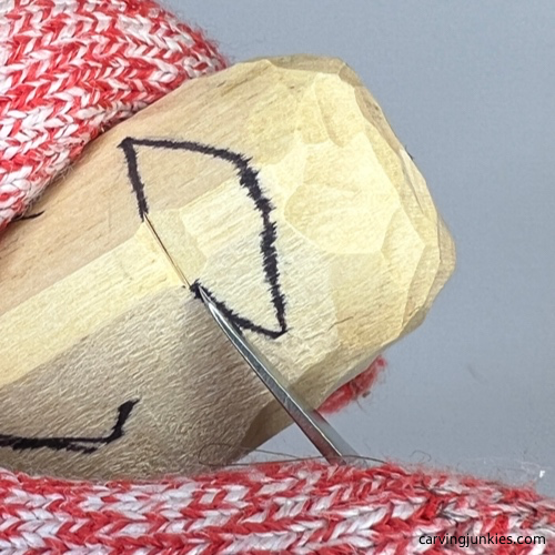 Knife used on wood carved mummy Carving eye socket on wooden mummy carving