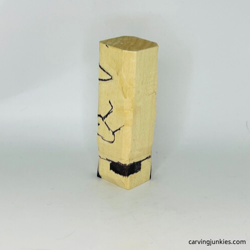 Left side wood marked for removal on wood carved mummy Wood carved mummy left guidelines