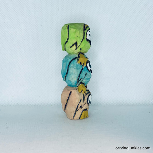 Left view of painted wood carved owl