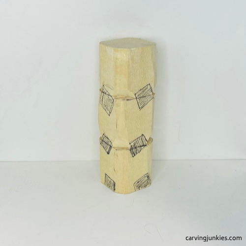 Stop cuts on front of wood carved owl