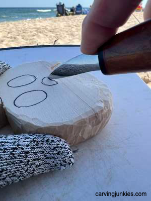 Separating nose on wood ghost pumpkin