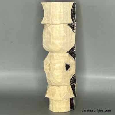 Half the wood carved scarecrow roughed out