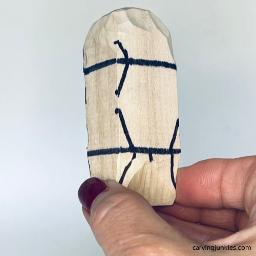 Back side guidelines on wood carved seal