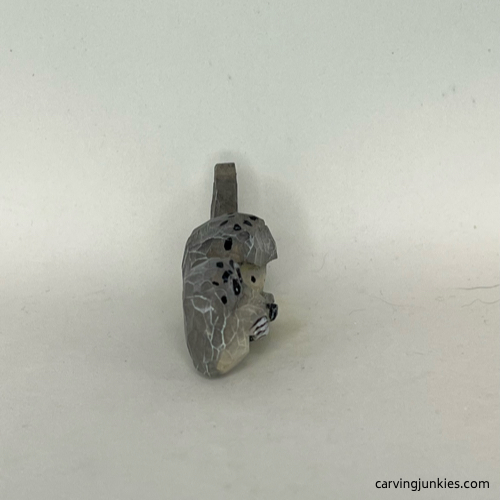 Right view of painted wood carved seal