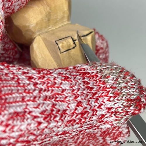 Carving bottom of wood carved seal