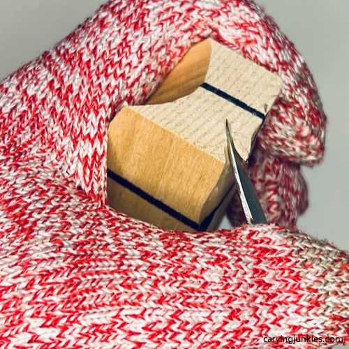 Starting the tail on wood carved seal