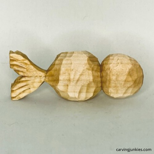 Back of unpainted wood carved seal