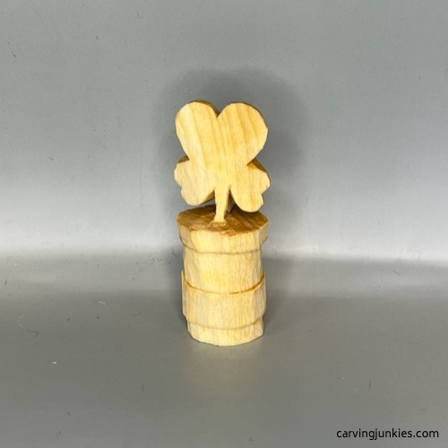 Back four-leaf clover completely carved before painting