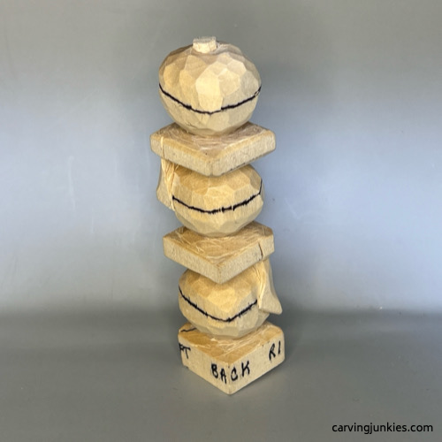 Back details for wood carved snowmanZ