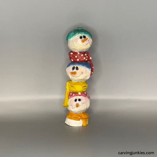 Front of painted wood carved snowman