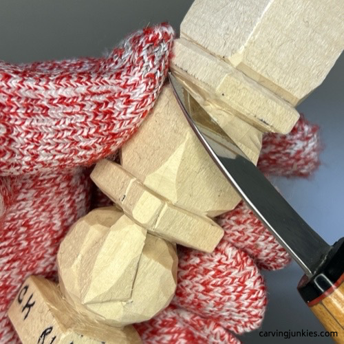 Rounding the heads on wood carved snowman stack
