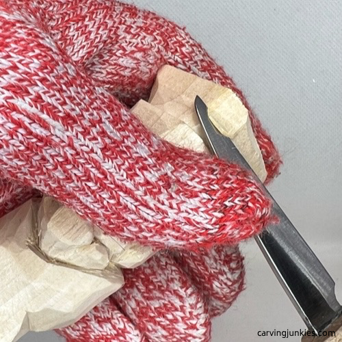 Flattening front of wood carved valentine gnome