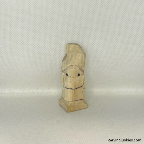 Nostrils are marked for carving on wood carved valentine gnome