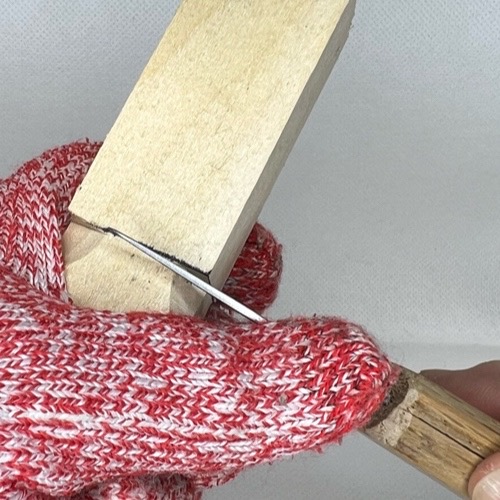 Separating wood on wood carved valentine gnome